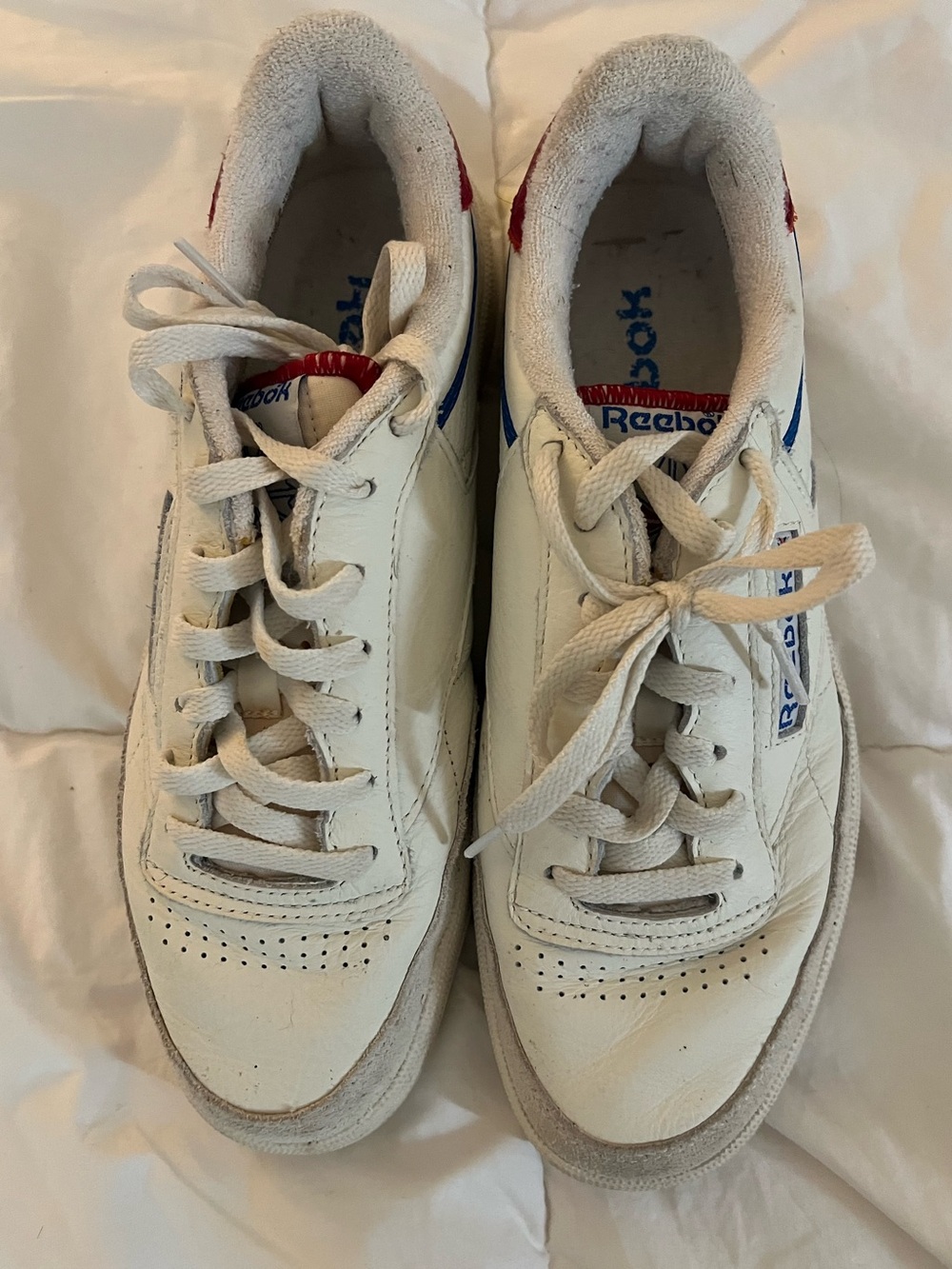Reebok Men’s White Sneakers with Blue & Red Accents